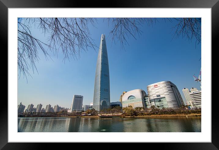 Landscape view fo Lotteworld tower Framed Mounted Print by Ambir Tolang