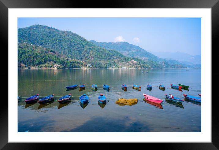 landscape view of boat on Phewa Lake Framed Mounted Print by Ambir Tolang