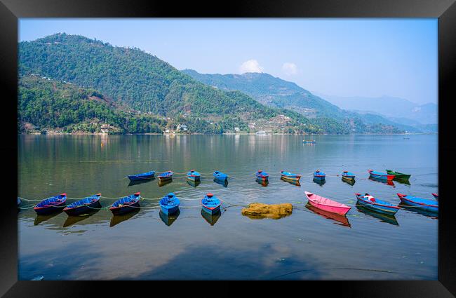 landscape view of boat on Phewa Lake Framed Print by Ambir Tolang