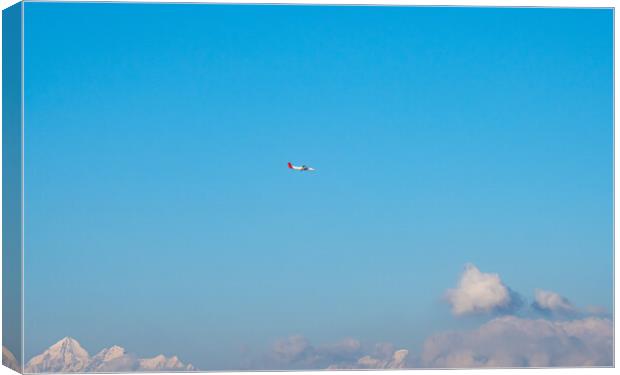 blue sky and plane  Canvas Print by Ambir Tolang
