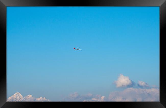 blue sky and plane  Framed Print by Ambir Tolang