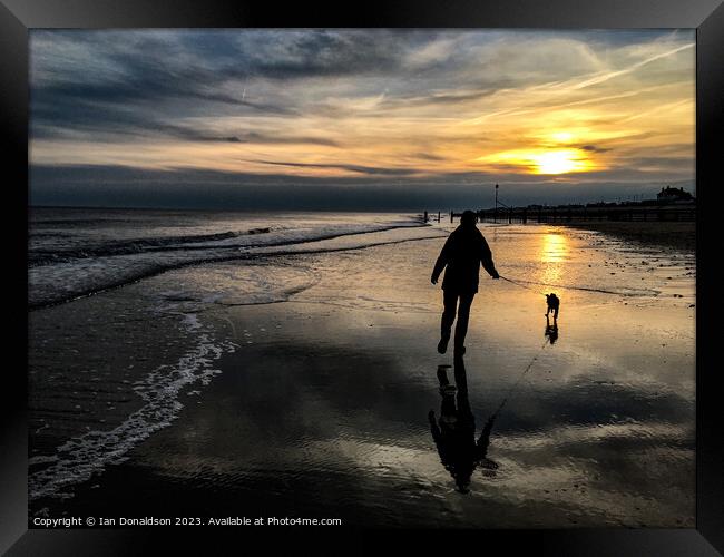 Beach Walk at Dawn Framed Print by Ian Donaldson
