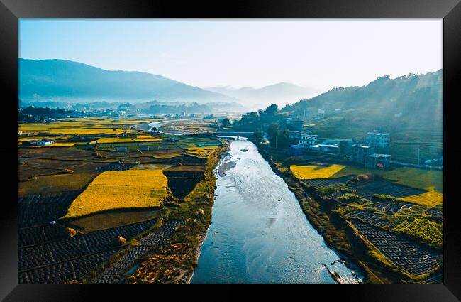 aerial view of paddy farm field and river with a mountain Framed Print by Ambir Tolang