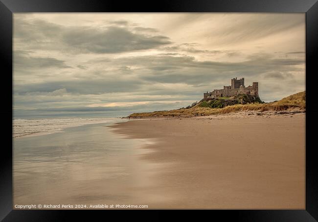 Storm Clouds over Bamburgh Castle Framed Print by Richard Perks