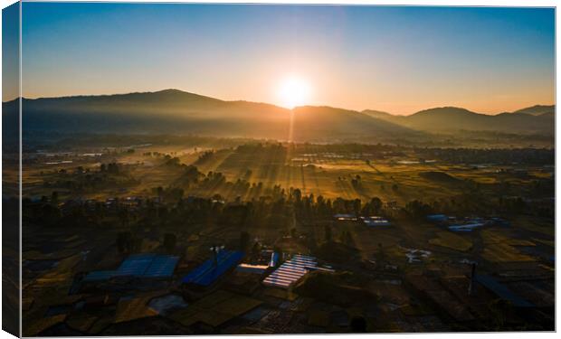 landscape view of sunrise over the kathmandu valley Canvas Print by Ambir Tolang