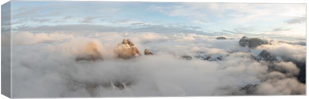 Tre cime di lavaredo aerial above the clouds Italian Dolomites Canvas Print by Sonny Ryse
