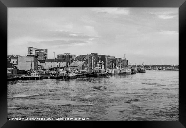 A Glimpse Through Time: Poole Harbour's Industrial to Residential Shift Framed Print by Stephen Young