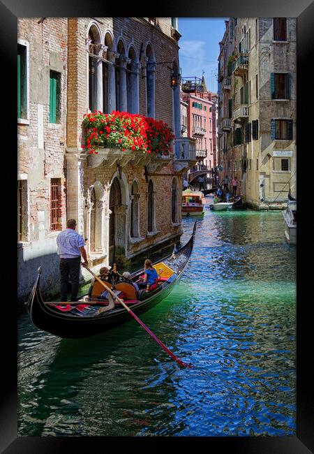 Tourist Gondola in Venice Italy Framed Print by John Gilham