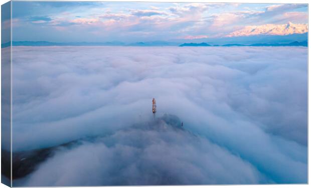 aerial view of sunrise over the foggy during winter season Canvas Print by Ambir Tolang