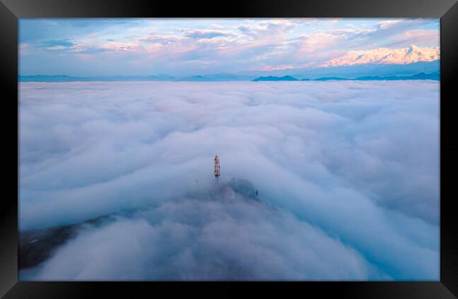 aerial view of sunrise over the foggy during winter season Framed Print by Ambir Tolang