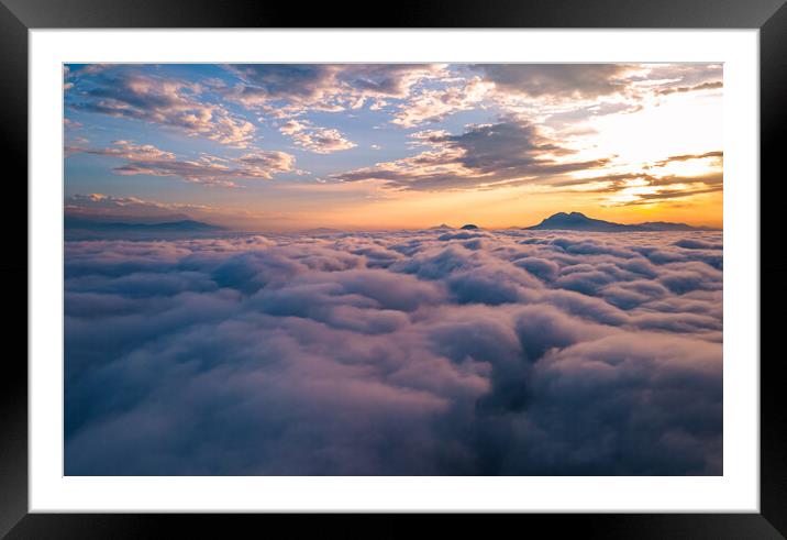 Landscape view of sunrise over the foggy during winter season Framed Mounted Print by Ambir Tolang