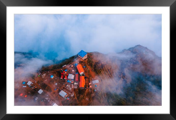 aerial  view of sunrise over the foggy during winter season Framed Mounted Print by Ambir Tolang