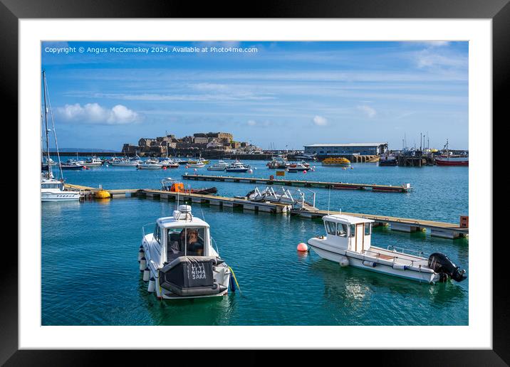 St Peter Port harbour in Guernsey, Channel Islands Framed Mounted Print by Angus McComiskey