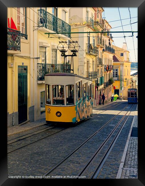 Lisbon tram Framed Print by Dudley Wood