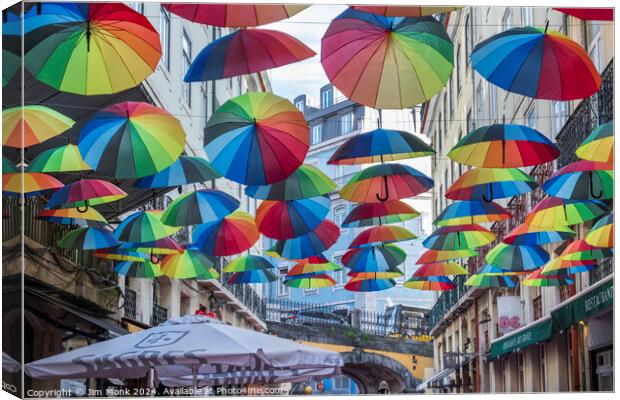 Colourful Umbrella Street in Lisbon Canvas Print by Jim Monk