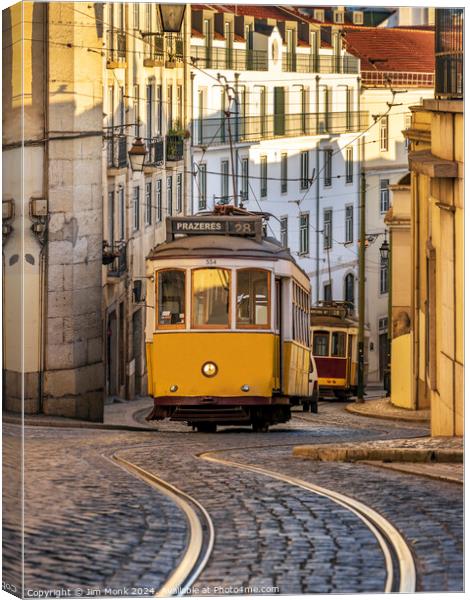 Vintage Yellow Tram in Lisbon Canvas Print by Jim Monk