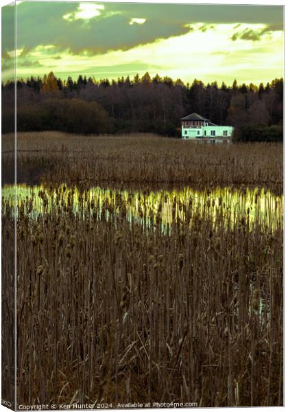 Boathouse and Bullrushes Canvas Print by Ken Hunter