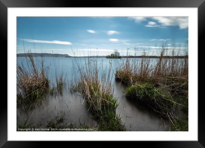 Through the Reeds Framed Mounted Print by Ken Hunter