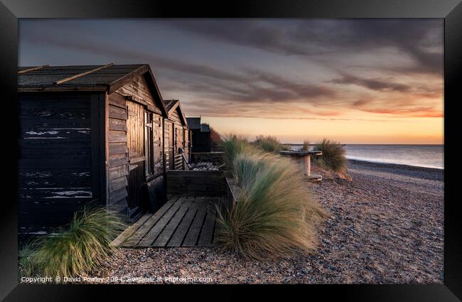 Walberswick Beach Huts At Sunrise Framed Print by David Powley