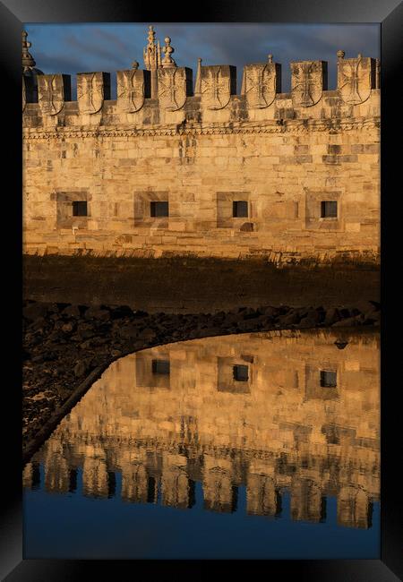 Belem Tower Wall With Reflection In Water Framed Print by Artur Bogacki