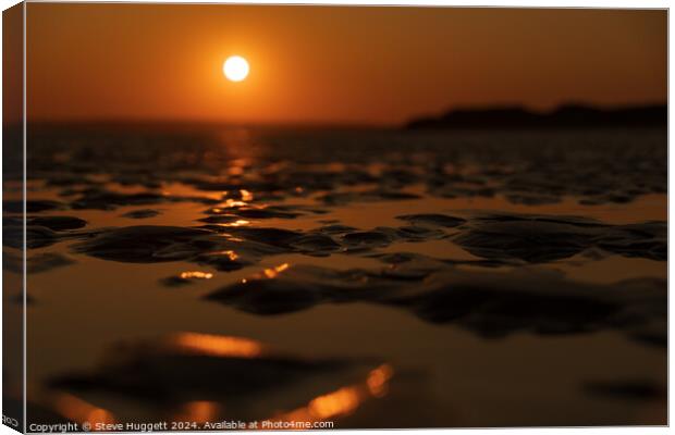 Sunset Across the Sand Canvas Print by Steve Huggett