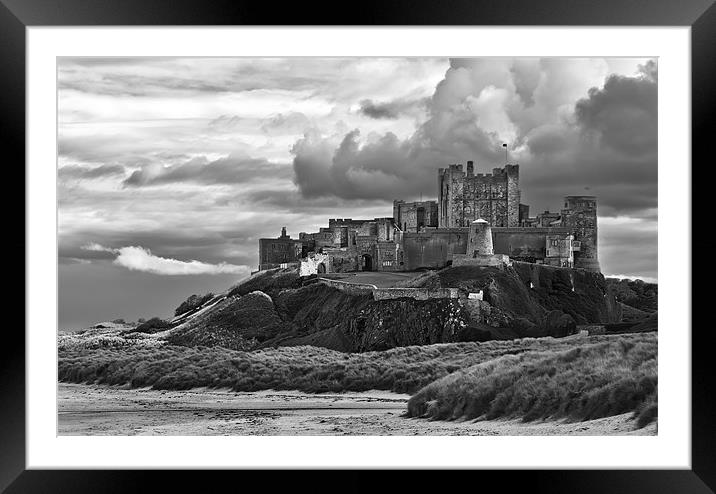 Cloudy Bamburgh Castle Framed Mounted Print by Kevin Tate