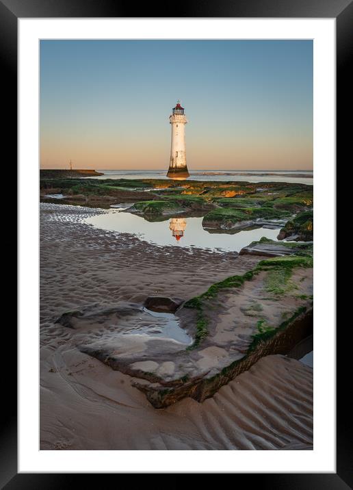 Lighthouse on the Rocks Framed Mounted Print by Liam Neon