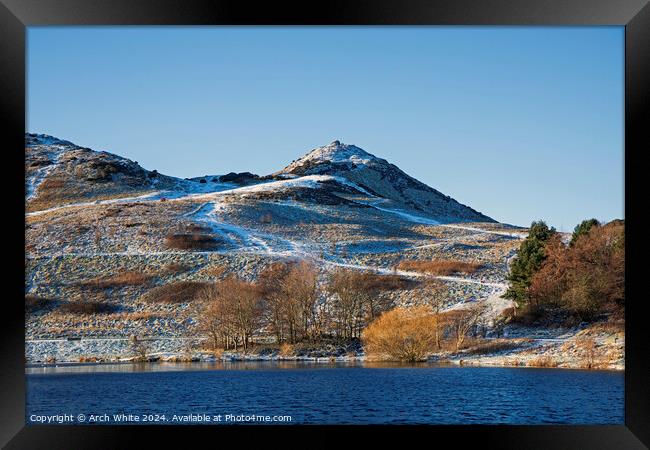 Dunsapie Loch with snow on Arthur's Seat in backgr Framed Print by Arch White