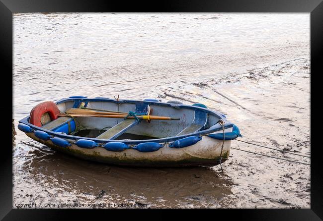 Row boat beached at low tide Framed Print by Chris Yaxley