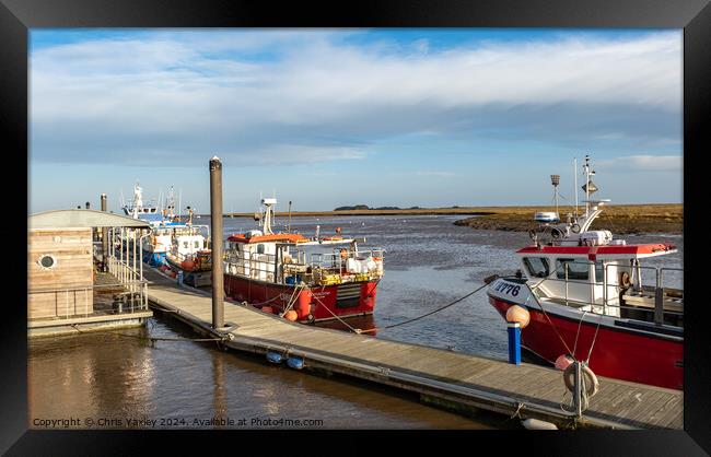 Fishing boats in the harbour Framed Print by Chris Yaxley