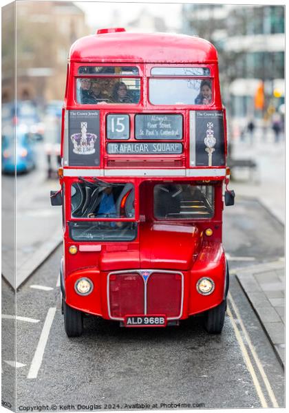 Red Bus to Trafalgar Square Canvas Print by Keith Douglas