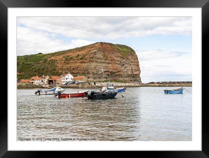 Commercial fishing boats moored in Staithes harbour on the North Yorkshire coast Framed Mounted Print by Chris Yaxley