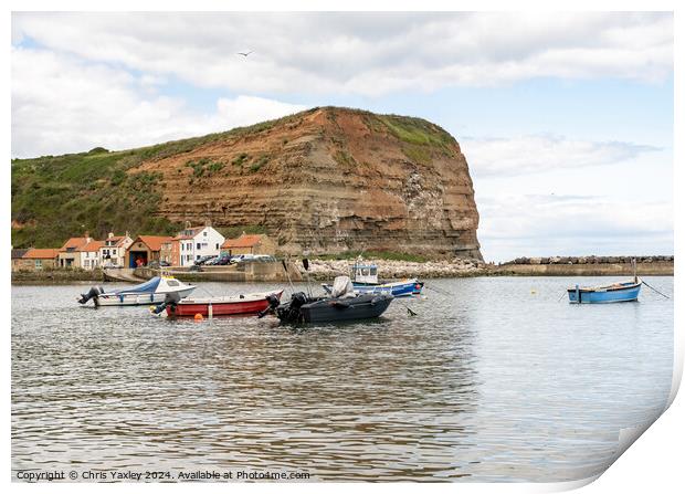 Commercial fishing boats moored in Staithes harbour on the North Yorkshire coast Print by Chris Yaxley