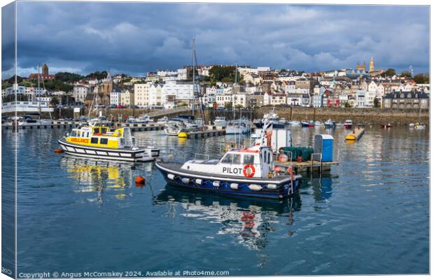 St Peter Port harbour in Guernsey, Channel Islands Canvas Print by Angus McComiskey