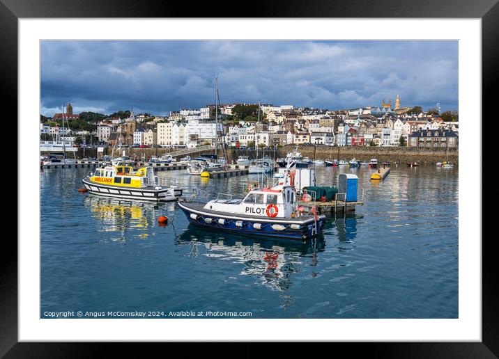 St Peter Port harbour in Guernsey, Channel Islands Framed Mounted Print by Angus McComiskey