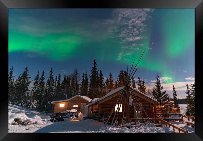 Aurora Borealis, Northern Lights, over aboriginal wooden cabin at Yellowknife, Northwest Territories, Canada Framed Print by Chun Ju Wu