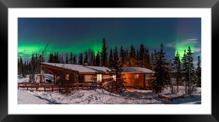 Panorama of Aurora Borealis, Northern Lights, over aboriginal wooden cabin at Yellowknife, Northwest Territories, Canada Framed Mounted Print by Chun Ju Wu