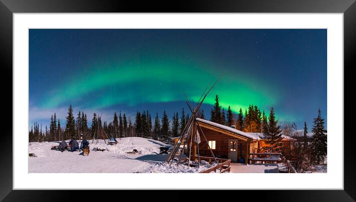 Panorama of Aurora Borealis, Northern Lights, over aboriginal wooden cabin at Yellowknife, Northwest Territories, Canada Framed Mounted Print by Chun Ju Wu