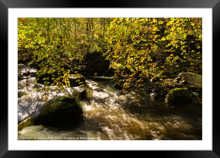 Dappled Sunlit Autumn Leaves and Rushing River Framed Mounted Print by Ken Hunter