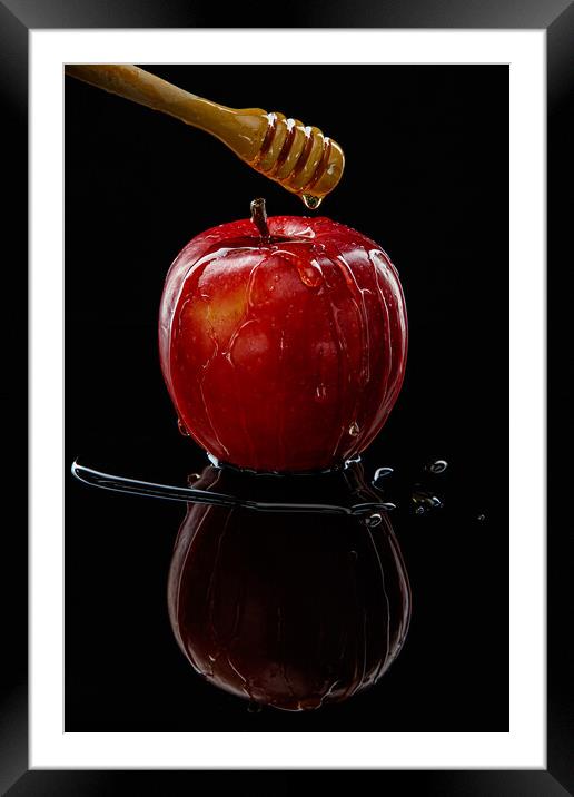 Red apple with honey on black Framed Mounted Print by Olga Peddi