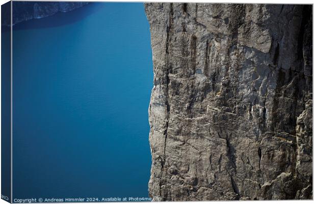 600 m high vertical cliff from Preikestolen down to the Lysefjor Canvas Print by Andreas Himmler