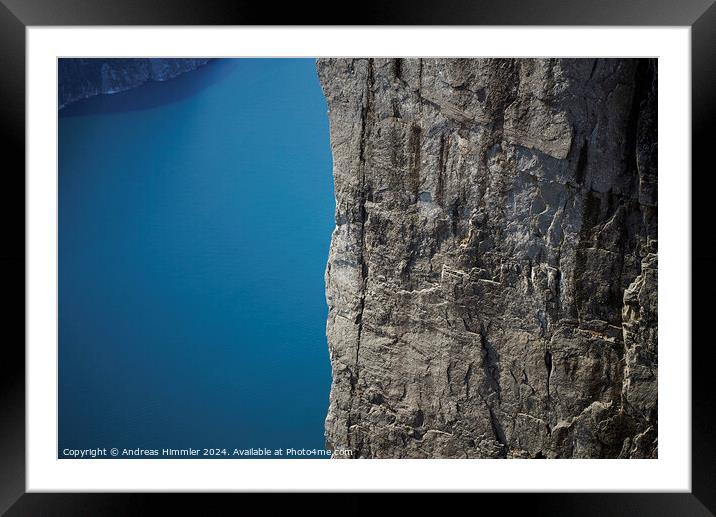 600 m high vertical cliff from Preikestolen down to the Lysefjor Framed Mounted Print by Andreas Himmler