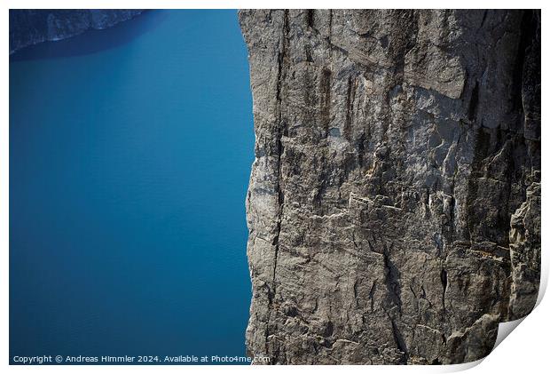 600 m high vertical cliff from Preikestolen down to the Lysefjor Print by Andreas Himmler