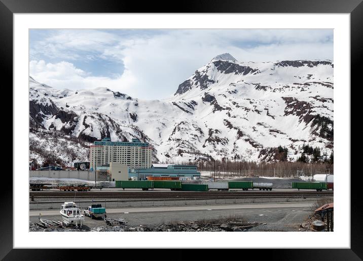 The Begich Towers Condominium building and snow covered mountains behind, Whittier, Alaska, USA Framed Mounted Print by Dave Collins