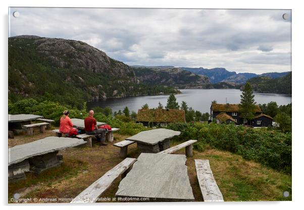 A couple relaxes at Preikestolen Base Camp with a view of Lake R Acrylic by Andreas Himmler