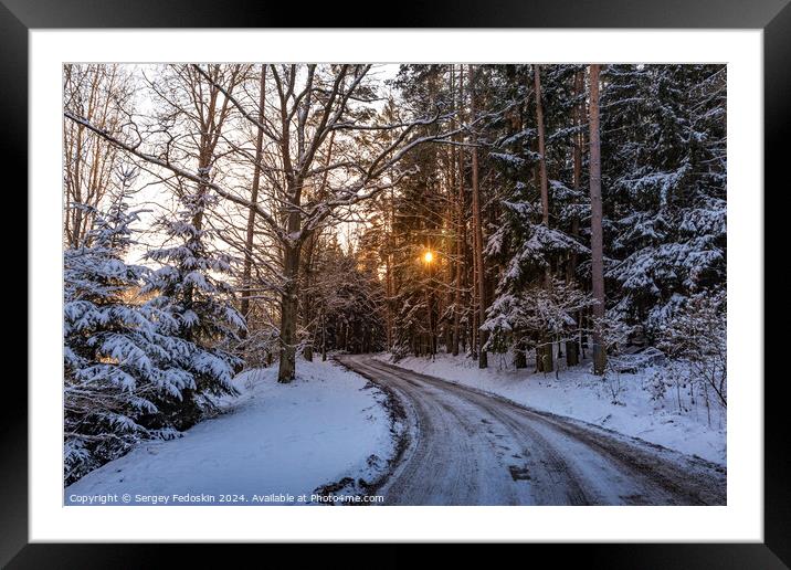 Small country road in winter with sunshine on trees Framed Mounted Print by Sergey Fedoskin