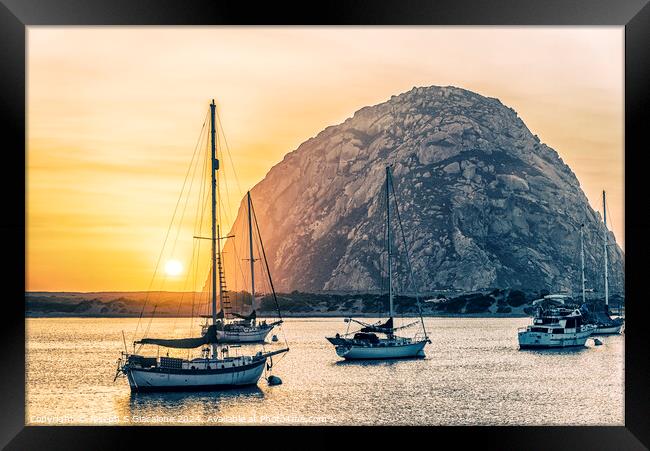 Setting Next To Morro Rock Framed Print by Joseph S Giacalone