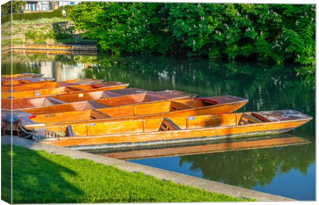 Punts moored on the River Cam in Cambridge Canvas Print by Keith Douglas
