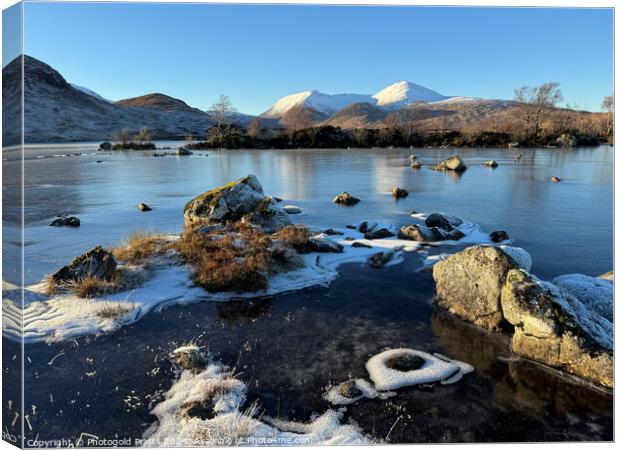 Loch nah achlaise and snow covered Black Mount in the Highlands of Scotland Canvas Print by Photogold Prints