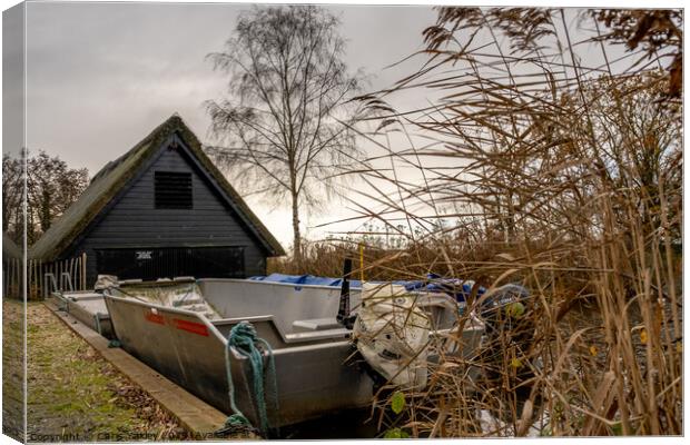 Boats outside the boat shed at How Hill staithe, Norfolk Broads Canvas Print by Chris Yaxley